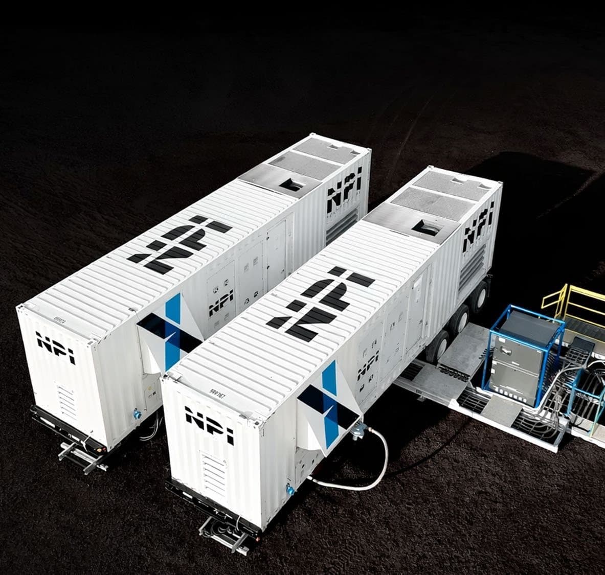NexSource mobile generator packages photographed at night