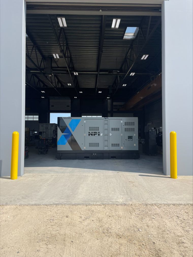 NPI Series generator package in the bay door at the NexSource shop, ready to ship