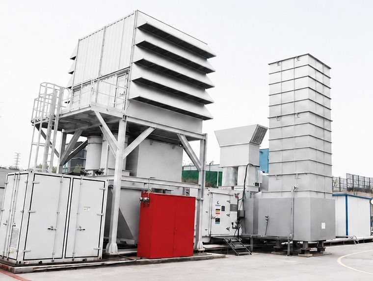 Gas turbine generator package with exhaust stack and air intake filter house